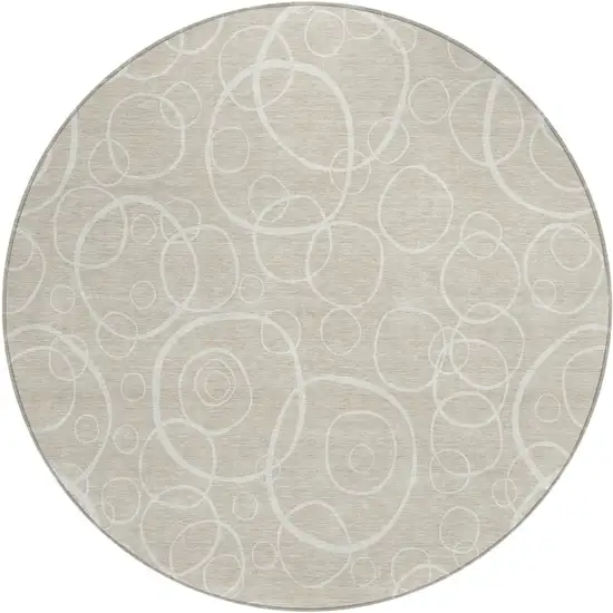 8' Beige And Ivory Round Geometric Washable Indoor Outdoor Area Rug Photo 1