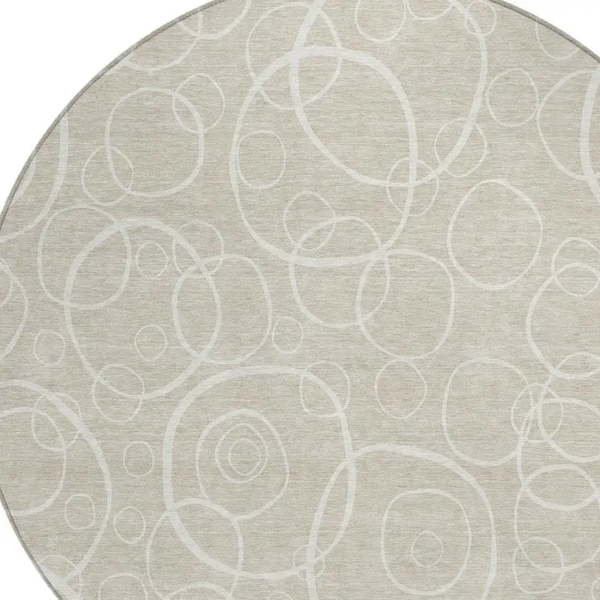 8' Beige And Ivory Round Geometric Washable Indoor Outdoor Area Rug Photo 2