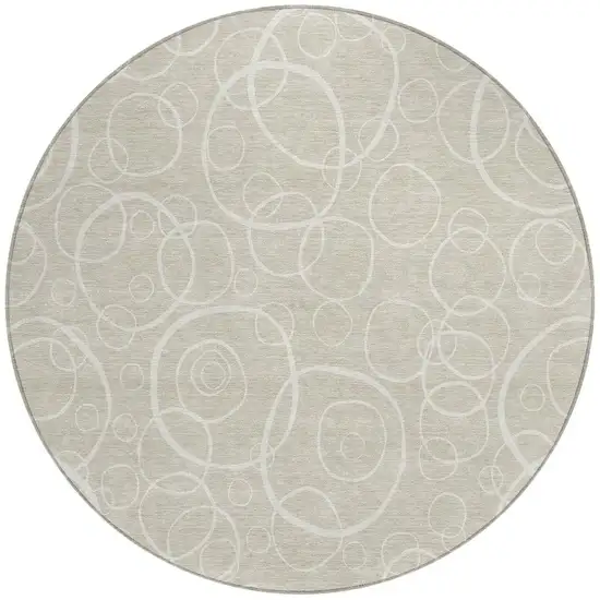 8' Beige And Ivory Round Geometric Washable Indoor Outdoor Area Rug Photo 3