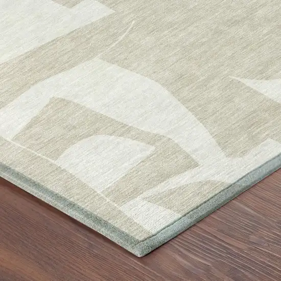 8' Beige And Ivory Round Geometric Washable Indoor Outdoor Area Rug Photo 4