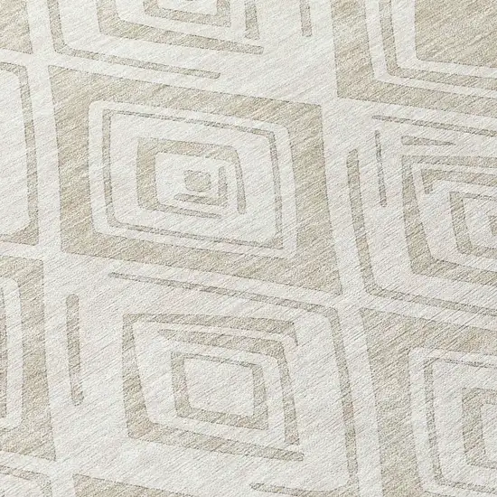 8' Beige And Ivory Round Geometric Washable Indoor Outdoor Area Rug Photo 9