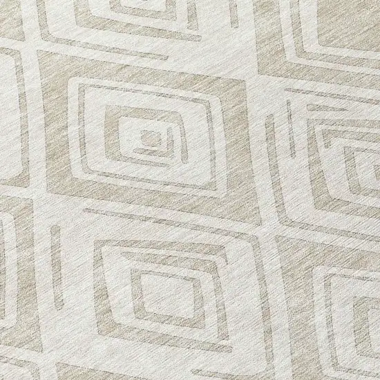 8' Beige And Ivory Round Geometric Washable Indoor Outdoor Area Rug Photo 9