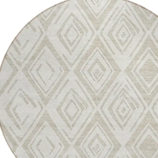8' Beige And Ivory Round Geometric Washable Indoor Outdoor Area Rug Photo 4