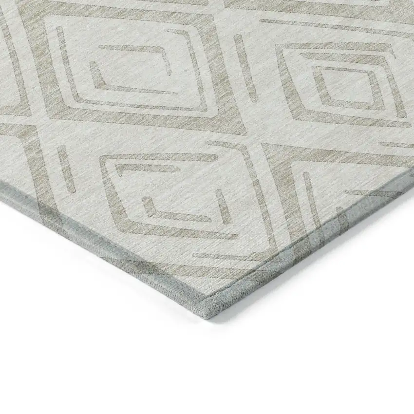 8' Beige And Ivory Round Geometric Washable Indoor Outdoor Area Rug Photo 3