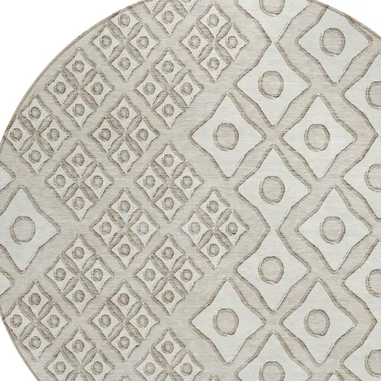 8' Beige And Ivory Round Geometric Washable Indoor Outdoor Area Rug Photo 4