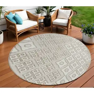 Photo of 8' Beige And Ivory Round Geometric Washable Indoor Outdoor Area Rug