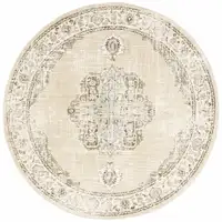 Photo of 8' Beige And Ivory Round Oriental Power Loom Stain Resistant Area Rug