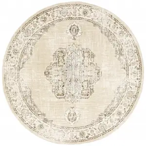 Photo of 8' Beige And Ivory Round Oriental Power Loom Stain Resistant Area Rug