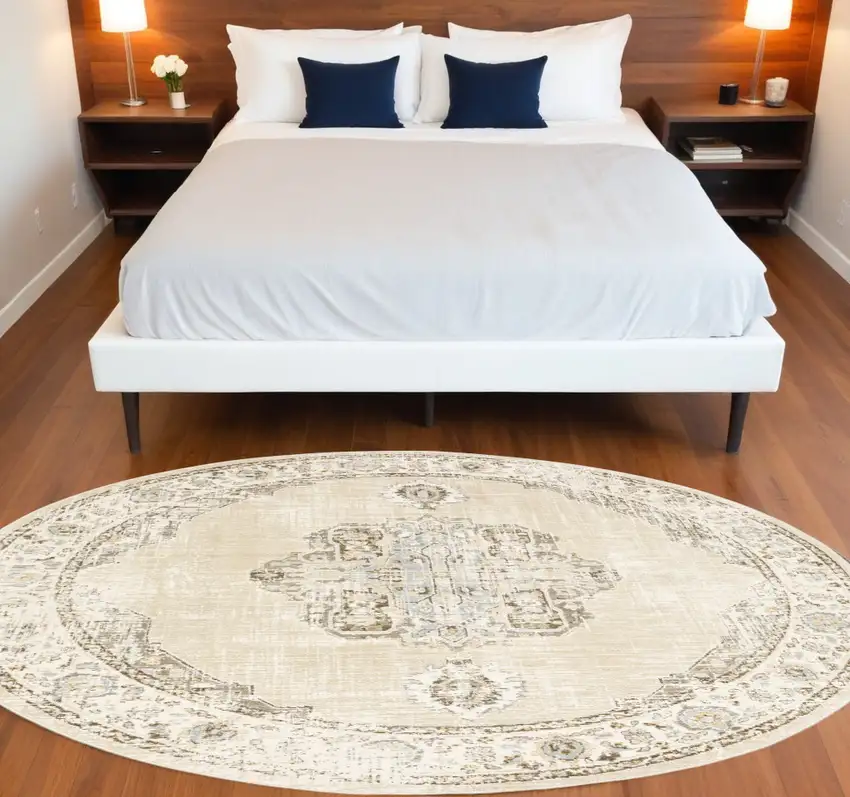 8' Beige and Ivory Round Oriental Power Loom Area Rug Photo 1