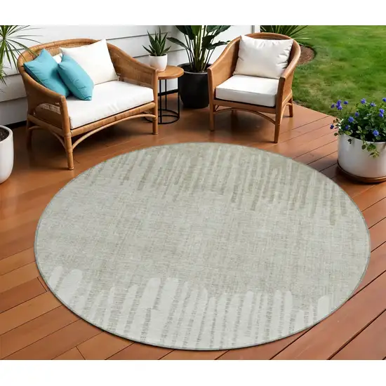 8' Beige And Ivory Round Striped Washable Indoor Outdoor Area Rug Photo 2