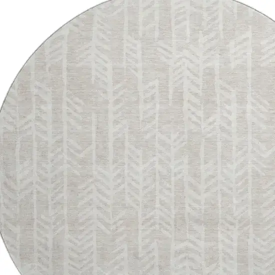8' Beige And Ivory Tribal Washable Round Rug With UV Protection Photo 3