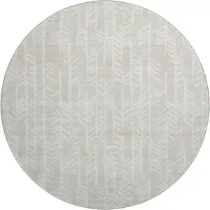 Photo of 8' Beige And Ivory Tribal Washable Round Rug With UV Protection