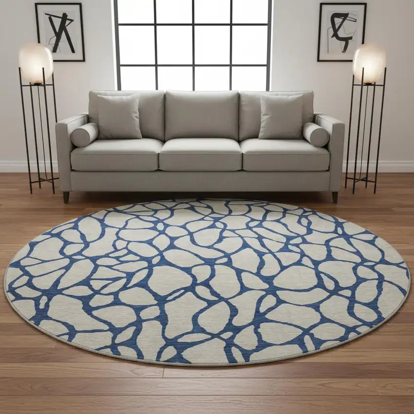 8' Beige And Navy Blue Geometric Washable Round Rug With UV Protection Photo 2