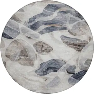 Photo of 8' Beige And Navy Blue Round Abstract Washable Indoor Outdoor Area Rug