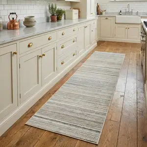 Photo of 8' Beige And Navy Blue Striped Runner Rug
