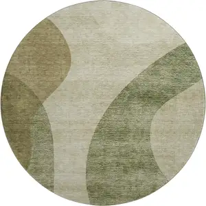 Photo of 8' Beige And Olive Green Geometric Washable Round Rug With UV Protection