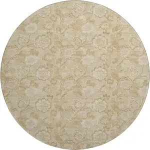 Photo of 8' Beige And Tan Floral Washable Round Rug With UV Protection