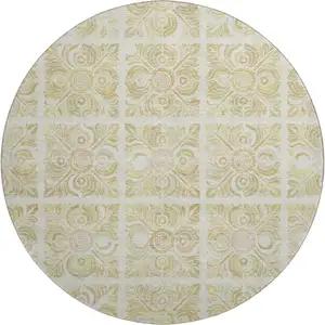 Photo of 8' Beige And Tan Medallion Washable Round Rug With UV Protection