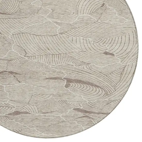 8' Beige And Tan Round Abstract Washable Indoor Outdoor Area Rug Photo 5