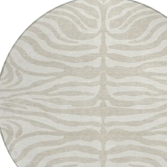 8' Beige And Tan Round Animal Print Washable Indoor Outdoor Area Rug Photo 5