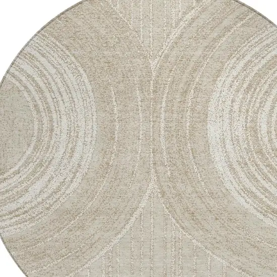 8' Beige And Tan Round Geometric Washable Indoor Outdoor Area Rug Photo 2