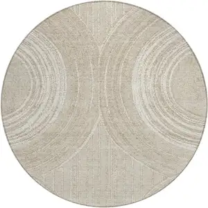 Photo of 8' Beige And Tan Round Geometric Washable Indoor Outdoor Area Rug