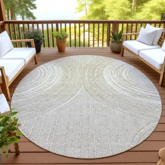 8' Beige And Tan Round Geometric Washable Indoor Outdoor Area Rug Photo 4