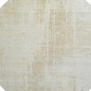 Photo of 8' Beige And Taupe Abstract Washable Round Rug With UV Protection