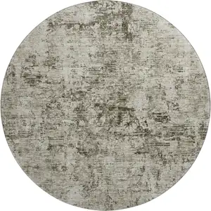 Photo of 8' Beige And Taupe Abstract Washable Round Rug With UV Protection
