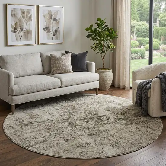 8' Beige And Taupe Abstract Washable Round Rug With UV Protection Photo 1