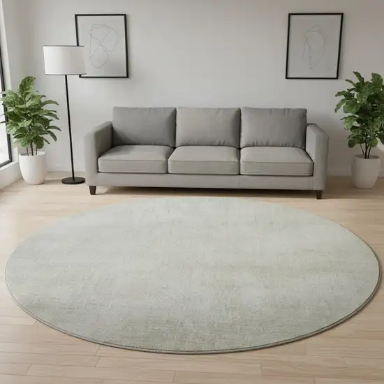 8' Beige And Taupe Abstract Washable Round Rug With UV Protection Photo 2