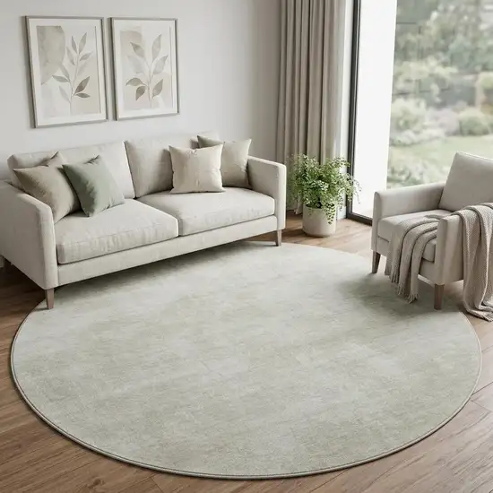 8' Beige And Taupe Abstract Washable Round Rug With UV Protection Photo 1