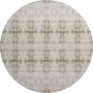 Photo of 8' Beige And Taupe Geometric Washable Round Rug With UV Protection
