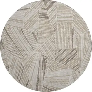 Photo of 8' Beige And Taupe Geometric Washable Round Rug With UV Protection
