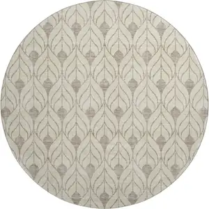 Photo of 8' Beige And Taupe Geometric Washable Round Rug With UV Protection
