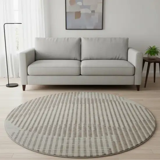 8' Beige And Taupe Geometric Washable Round Rug With UV Protection Photo 2