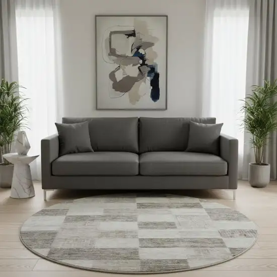 8' Beige And Taupe Geometric Washable Round Rug With UV Protection Photo 2