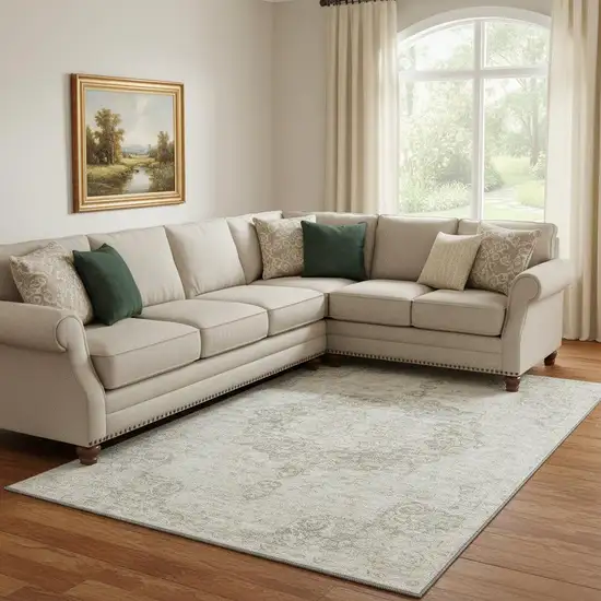 8' Beige And Taupe Oriental Washable Area Rug With UV Protection Photo 2