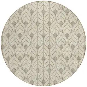 Photo of 8' Beige And Taupe Round Geometric Washable Indoor Outdoor Area Rug