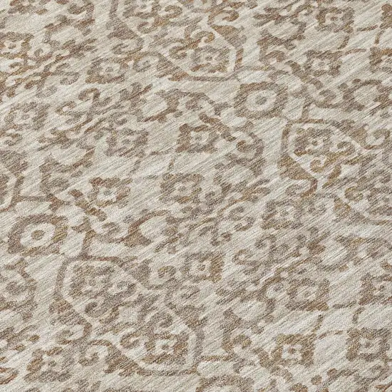 8' Beige And Taupe Round Oriental Washable Indoor Outdoor Area Rug Photo 6