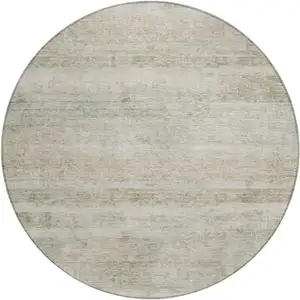Photo of 8' Beige And Taupe Round Striped Washable Indoor Outdoor Area Rug