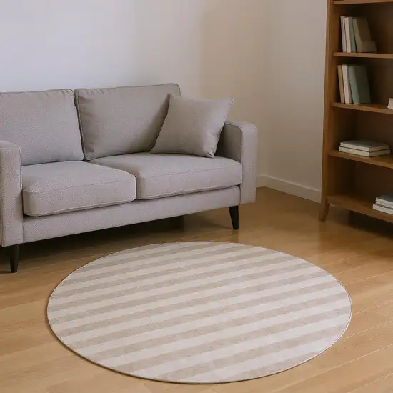 8' Beige And Taupe Striped Washable Round Rug With UV Protection Photo 2