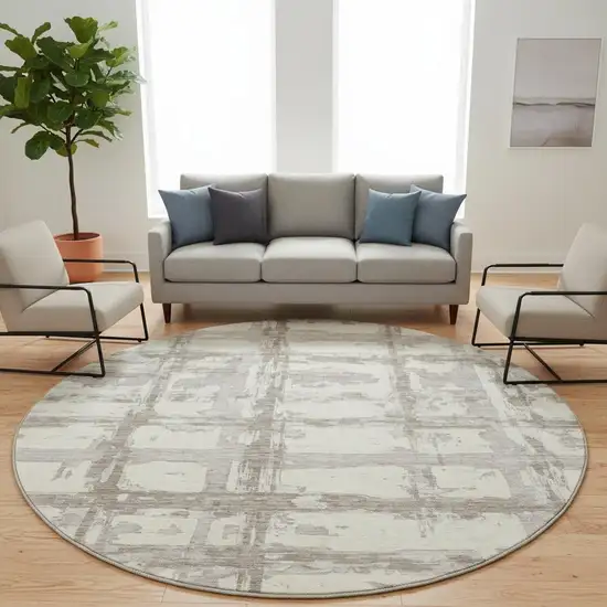 8' Beige And Taupe Striped Washable Round Rug With UV Protection Photo 2