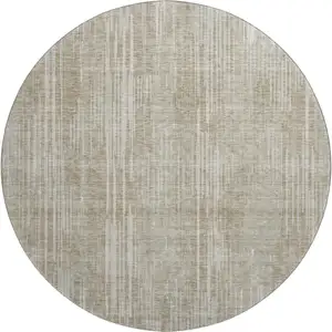 Photo of 8' Beige And Taupe Striped Washable Round Rug With UV Protection
