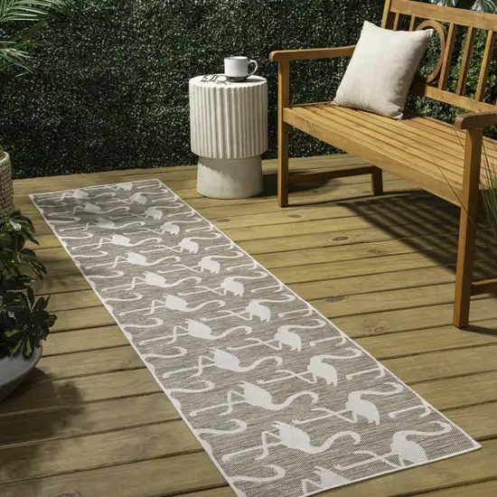 8' Beige And White Animal Print Indoor Outdoor Runner Rug Photo 5