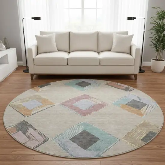 8' Beige Blue And Copper Geometric Washable Round Rug With UV Protection Photo 2