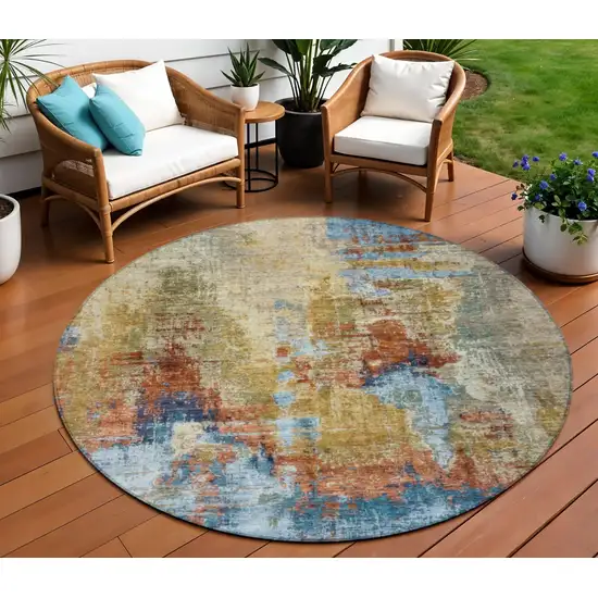 8' Beige Blue And Gold Round Abstract Washable Indoor Outdoor Area Rug Photo 1