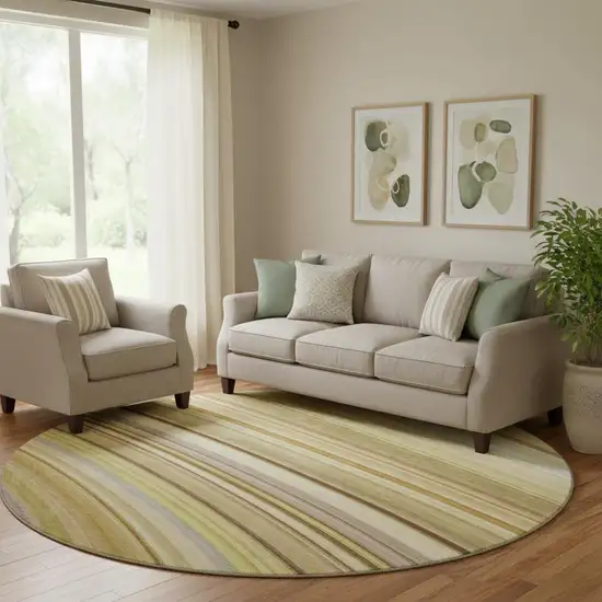 8' Beige Blue And Ivory Abstract Washable Round Rug With UV Protection Photo 1