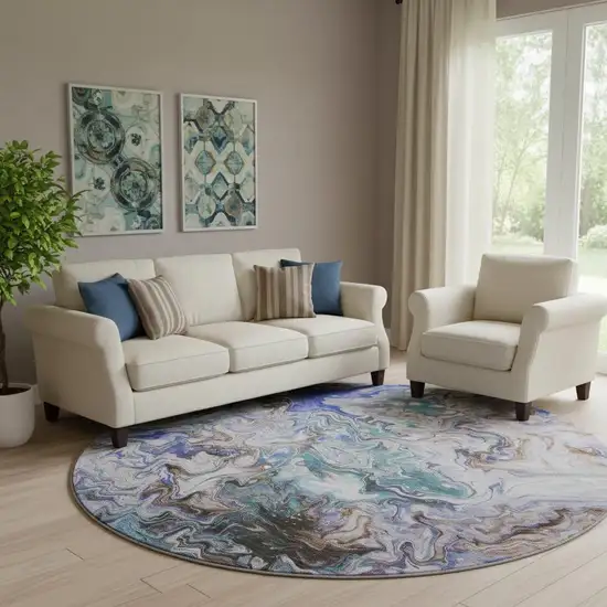 8' Beige Blue And Ivory Abstract Washable Round Rug With UV Protection Photo 1