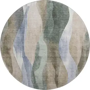 Photo of 8' Beige Blue And Ivory Abstract Washable Round Rug With UV Protection